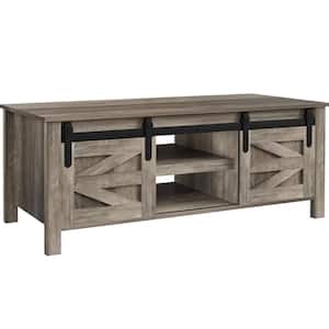 47 in. Farmhouse Washed Gray Rectangle Oak Wood Coffee Table with Sliding Barn Doors and Hidden Storage Compartments
