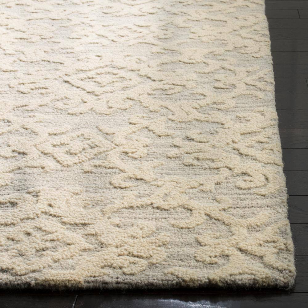 Handmade Gray Floral Round Wool Tufted Rug - 6' x 9'