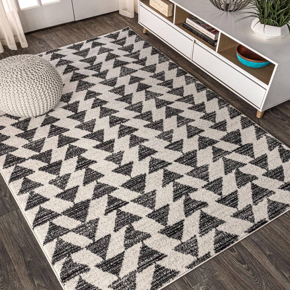 Aisha Cream and Black Geometric Synthetic Area Rug