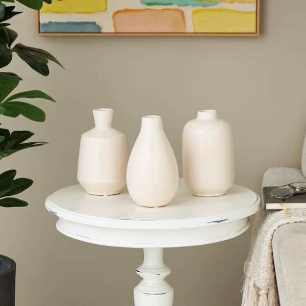 Litton Lane Cream Minimalistic Ceramic Decorative Vase with Varying Shapes (Set of 3)