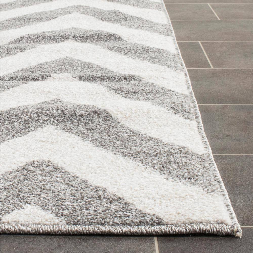 5' x 5' Dark Grey and Beige Reversible Synthetic Area Rug