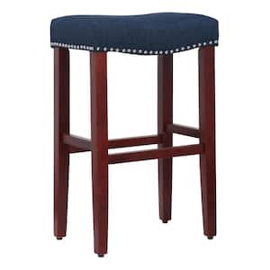 Jameson 29 in. Bar Height Cherry Wood Backless Nailhead Trim Barstool with Upholstered Navy Blue Linen Saddle Seat Stool