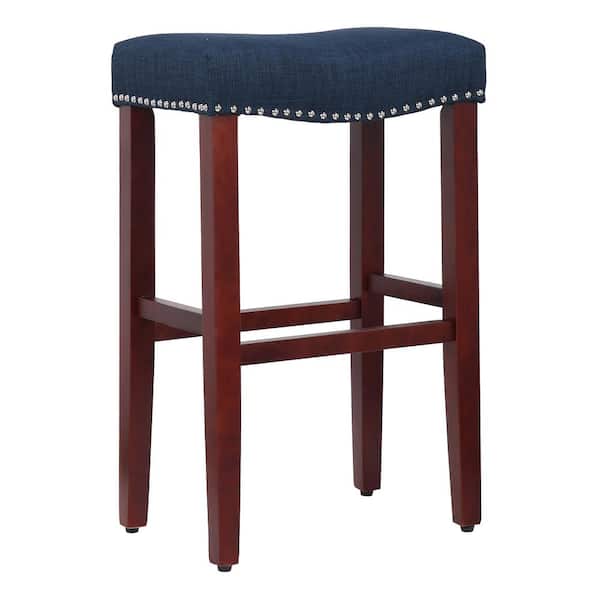 WESTINFURNITURE Jameson 29 in. Bar Height Cherry Wood Backless Nailhead Trim Barstool with Upholstered Navy Blue Linen Saddle Seat Stool