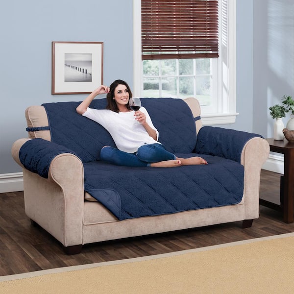 https://images.thdstatic.com/productImages/a601959b-e6bc-4512-b62c-cfabe2edd345/svn/navy-innovative-textile-solutions-slipcovers-9670lovnavy-76_600.jpg