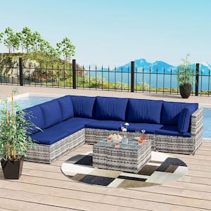 7-Piece Wicker Outdoor Sectional Set with Navy Blue Cushions and Coffee Table