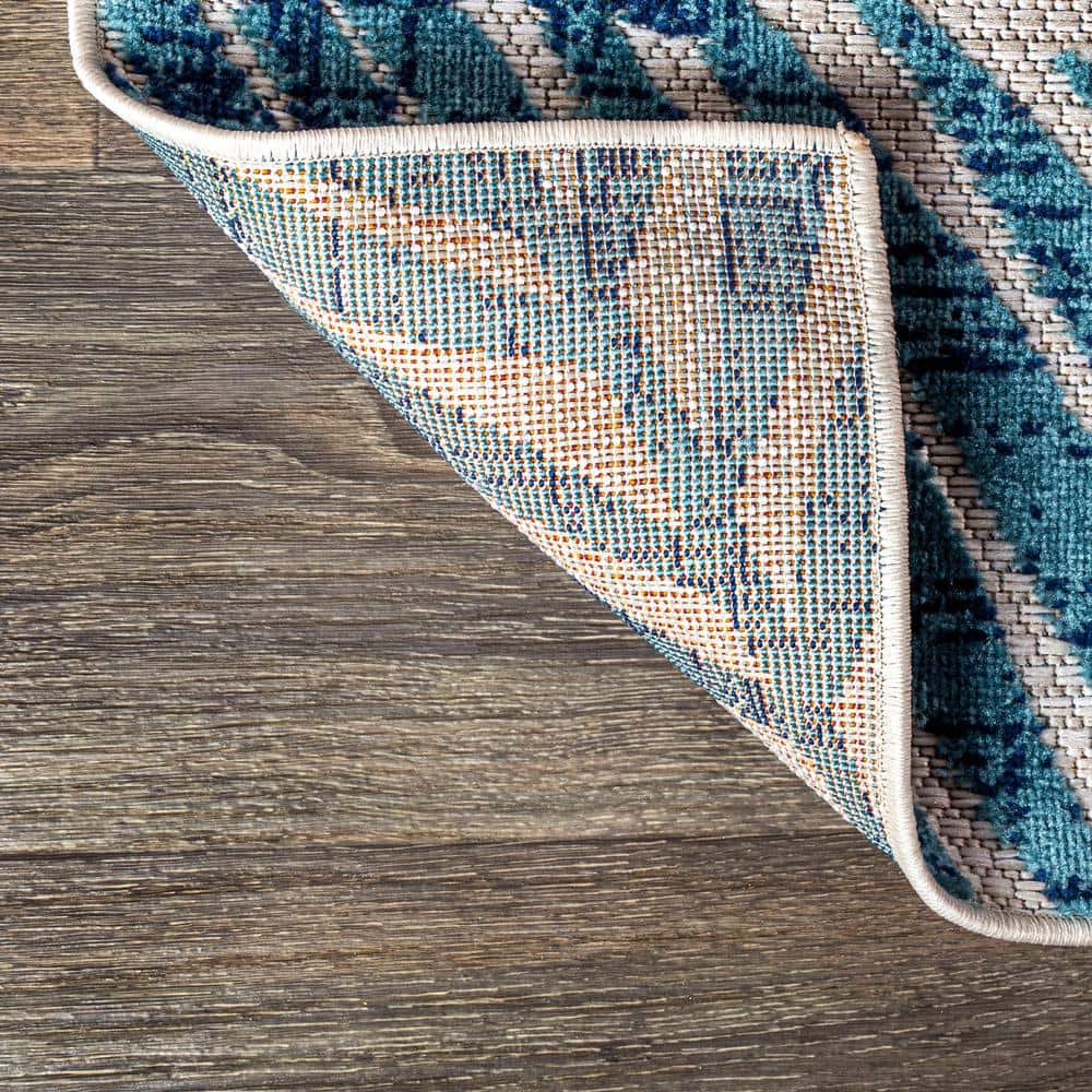 Cream and Orange Palm Leaves Synthetic 4' x 6' Area Rug