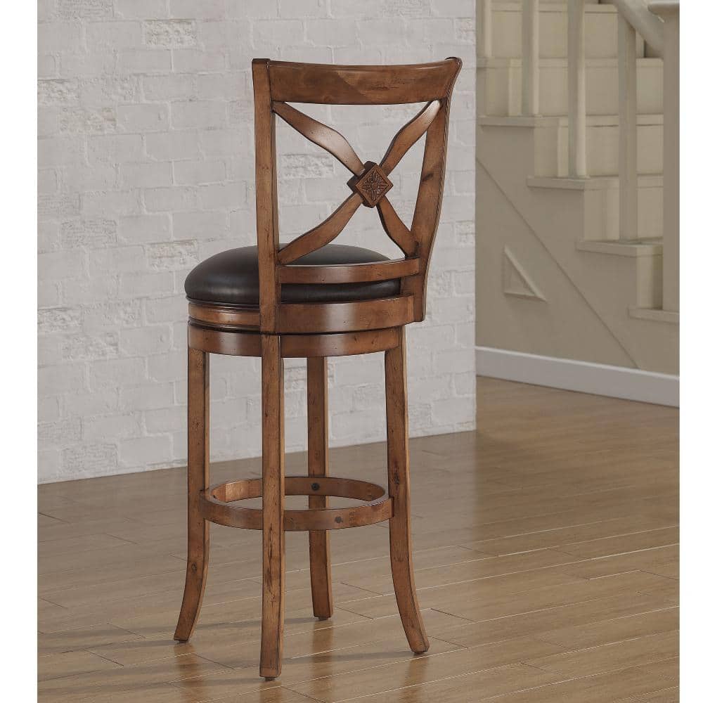 Transitional Brown Leather Swivel Chair with Carved Flower Detail