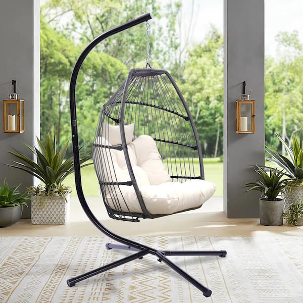 OLUMAT Wicker Patio Swing with Cushion and Pillow in Light Beige