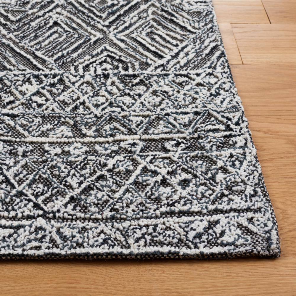 Black and Ivory Hand-Tufted Wool 8' x 10' Area Rug