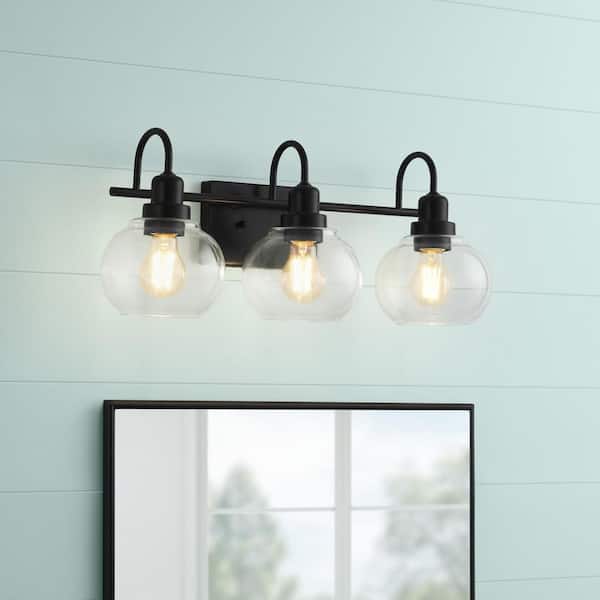 Home Decorators Collection Halyn 23 in. 3-Light Matte Black Bathroom Vanity Light with Clear Glass Shades