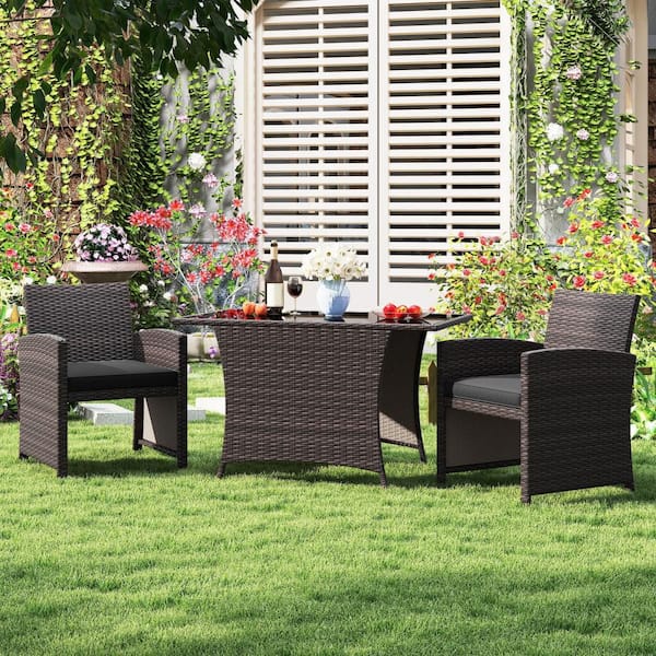 3-Piece Wicker Outdoor Bistro Set Balcony Furniture Set with Tempered Glass Dining Table Black Cushions