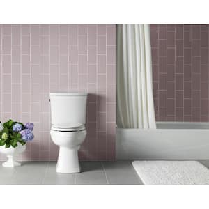 Kelston 12 in. Rough In 2-Piece 1.28 GPF Single Flush Elongated Toilet in Biscuit Seat Not Included