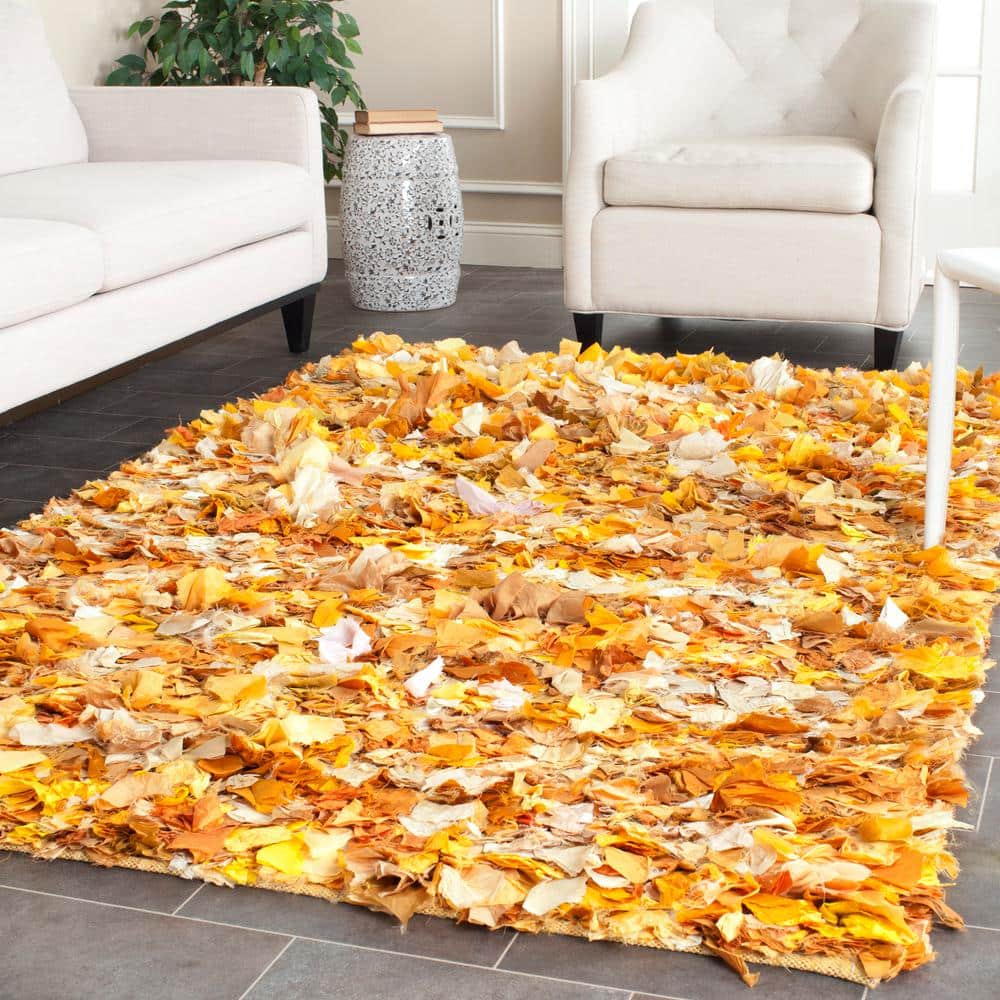 Handmade Ivory Shag Cotton-Synthetic Blend Rug 6' x 9'