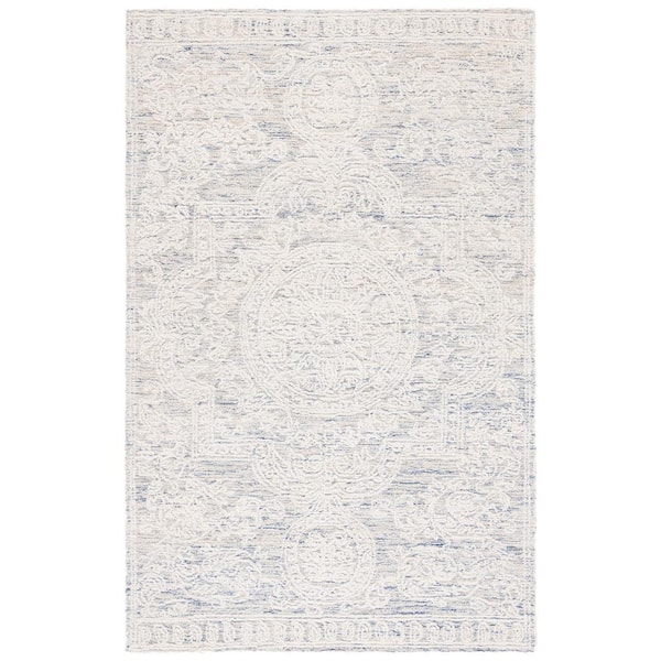 SAFAVIEH Abstract Ivory/Blue 6 ft. x 9 ft. Modern Aztec Medallion Area Rug