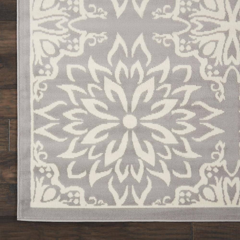 Ivory and Grey Floral Synthetic 7' x 10' Area Rug