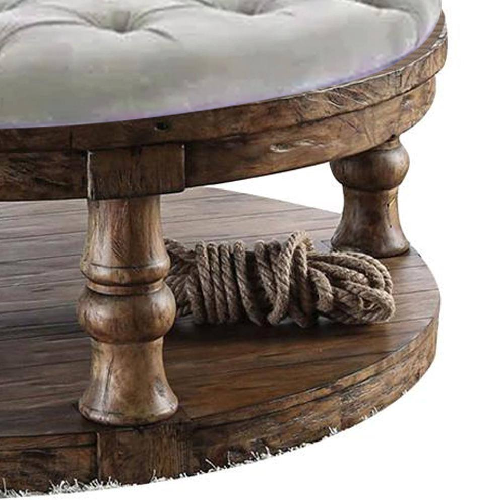 Pastoral Charm Round Oak Coffee Table with Button-Tufted Beige Linen Top