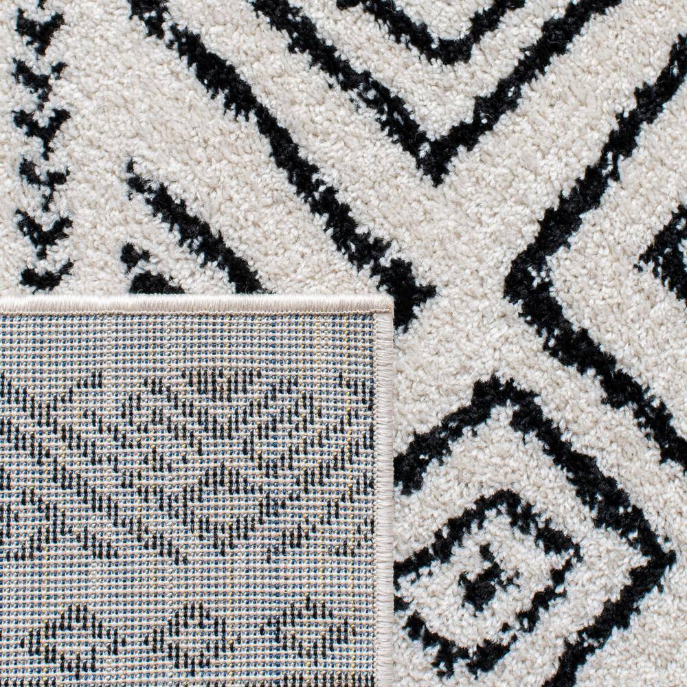 8' x 10' Black and Ivory Geometric Synthetic Area Rug