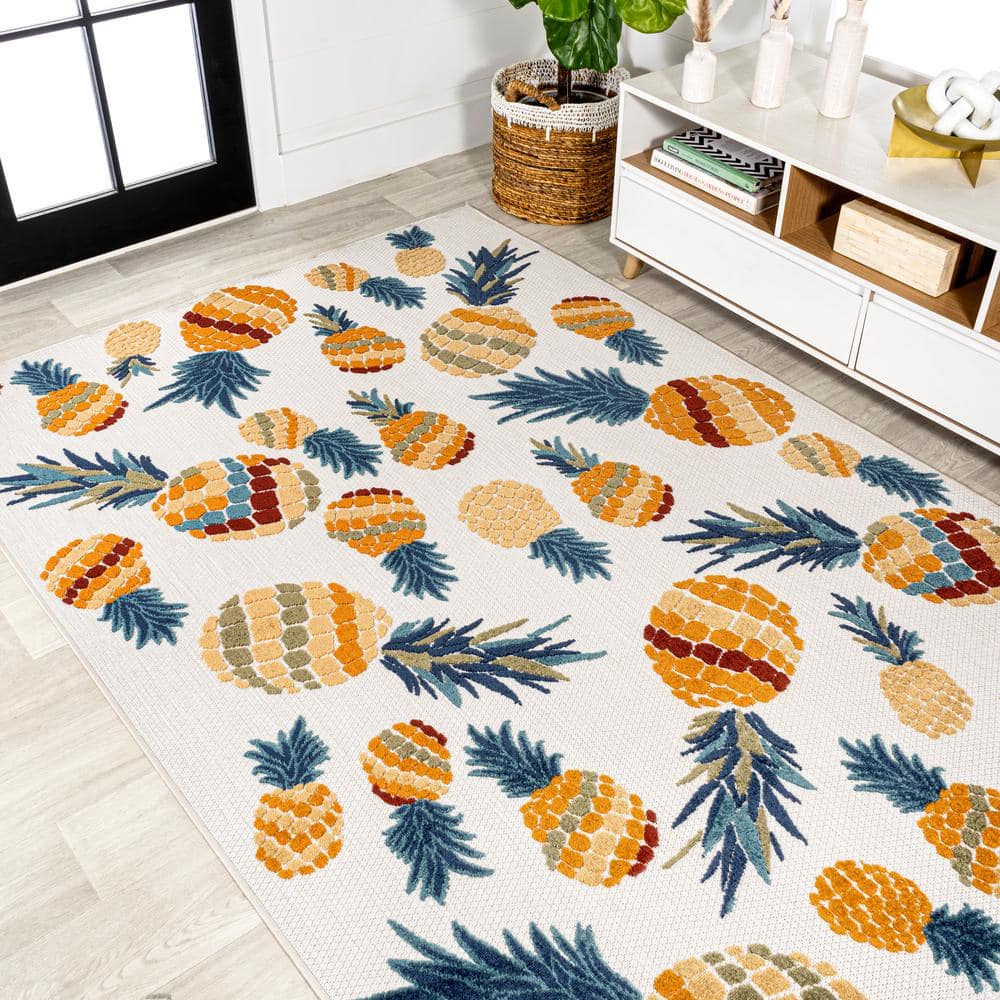 4' x 6' Ivory and Orange Floral Synthetic Area Rug