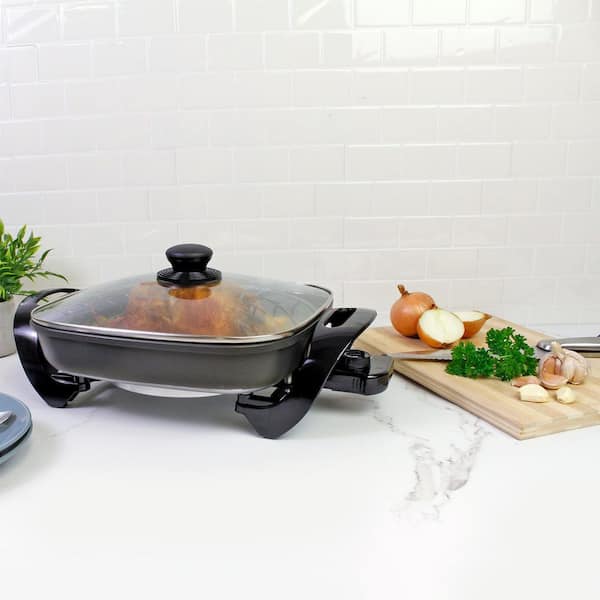 https://images.thdstatic.com/productImages/a6b59565-1aa8-43c4-8dca-c9479ac1fd5e/svn/black-and-gray-kenmore-electric-skillets-kksk12grey-c3_600.jpg