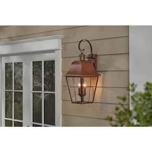 Warwick 28 in. H Aged Copper Finish Outdoor Hardwired Wall Lantern Seeded Glass