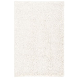 Milan Solid Shag 8 ft. x 10 ft. Ivory Living Room/Bedroom Area Rug
