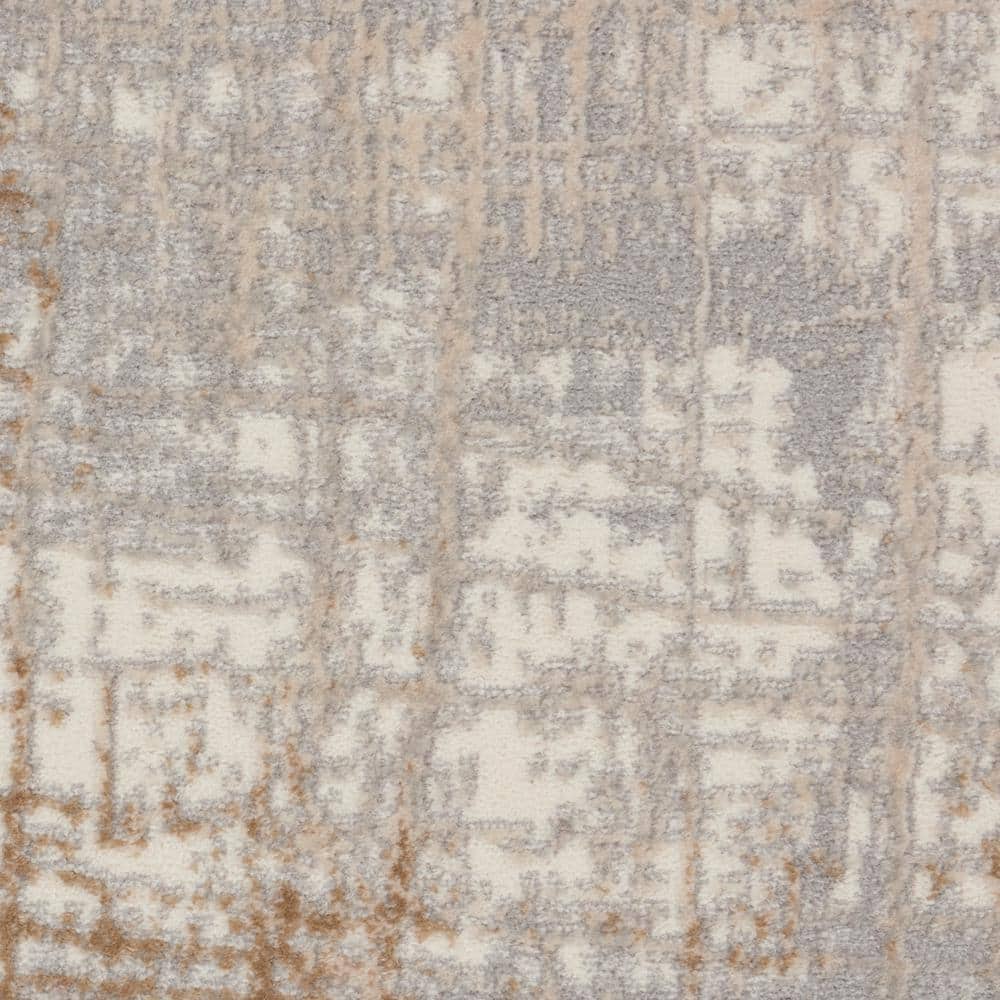Ivory and Taupe Abstract Rectangular Synthetic Rug, 3'2" x 5'