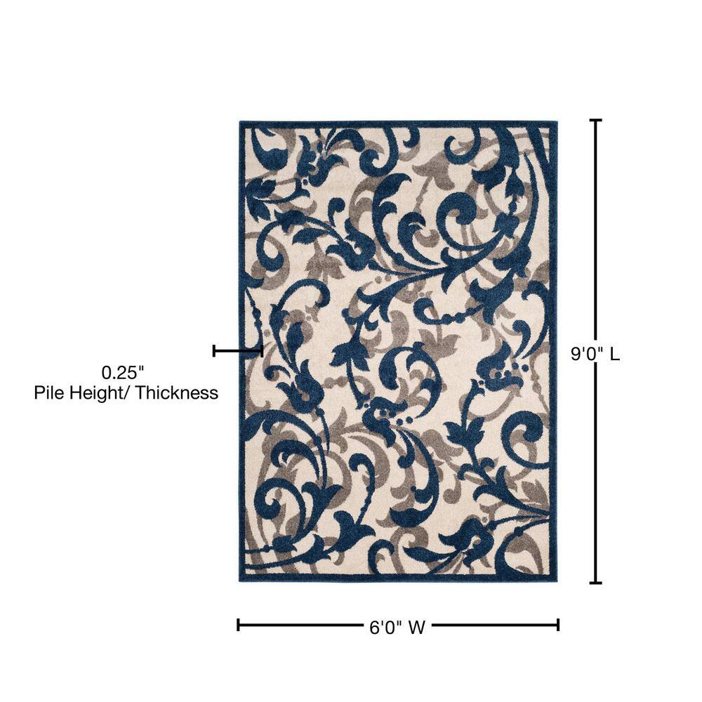Elegant Ivory Floral Round Synthetic 6' x 9' Area Rug