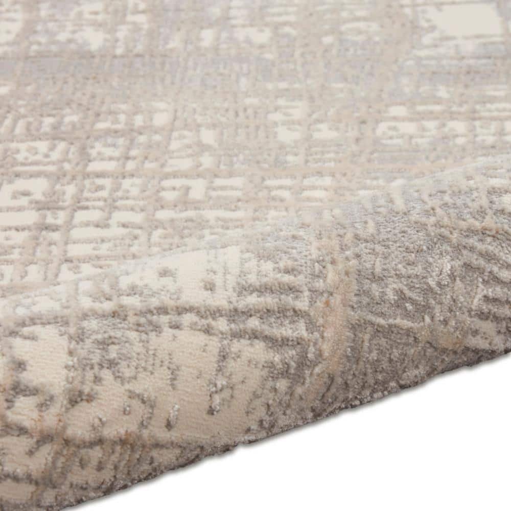 Ivory and Taupe Abstract Rectangular Synthetic Rug, 3'2" x 5'