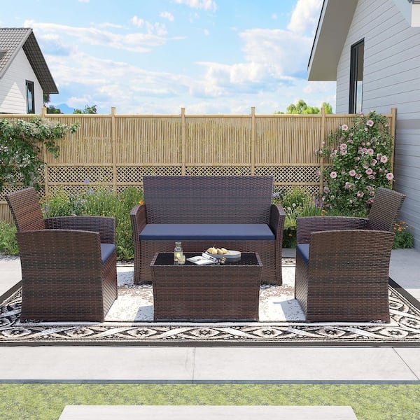 Unbranded 4-Piece Brown Wicker Outdoor Dining Set with Washed Blue Cushion