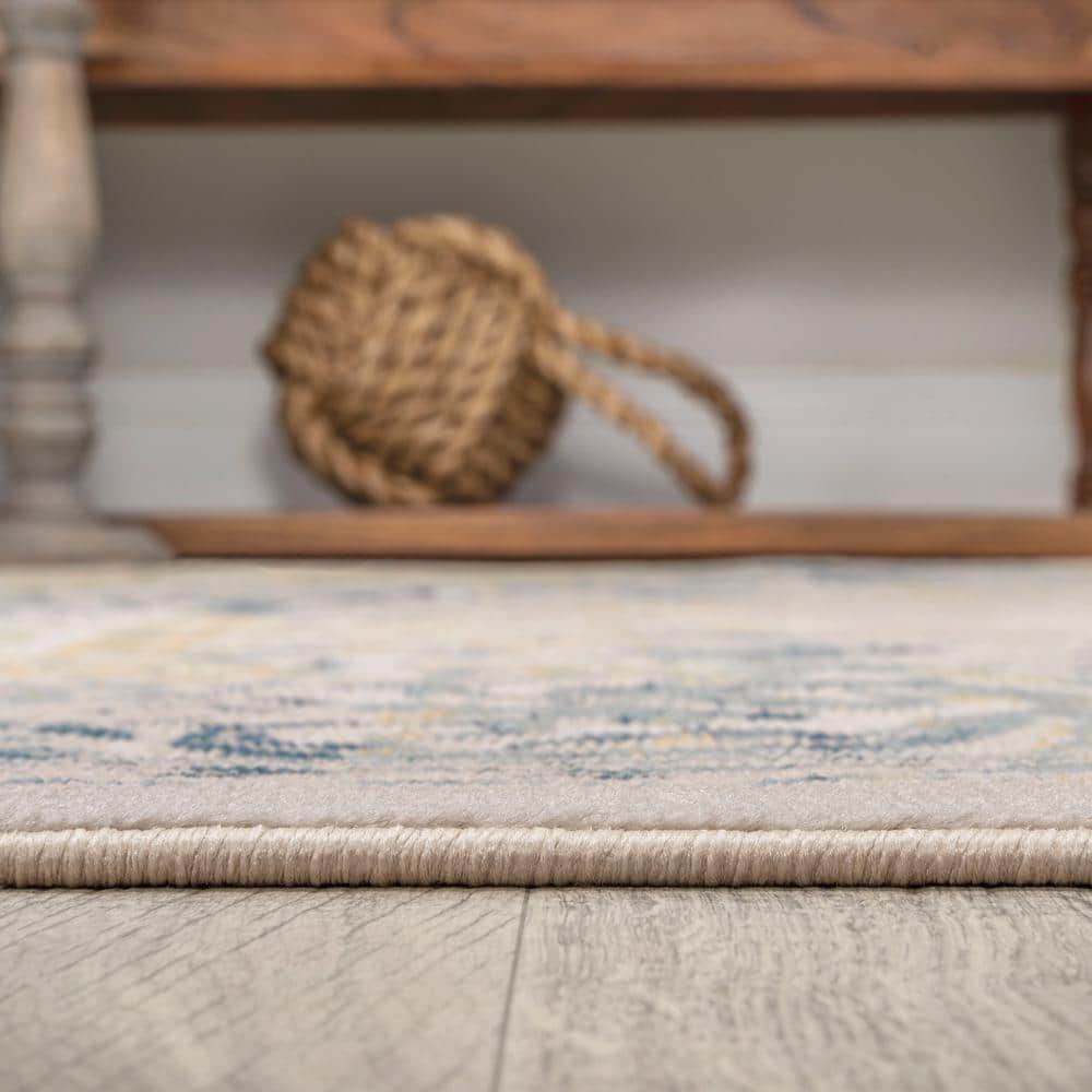 Ivory/Navy 4' x 6' Reversible Synthetic Medallion Rug