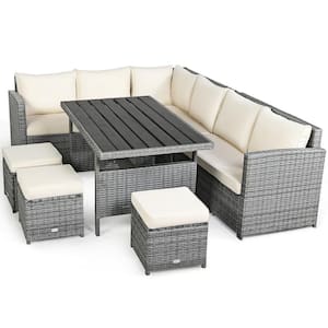 7-Piece Wicker Patio Conversation Set with White Cushions and Dining Table