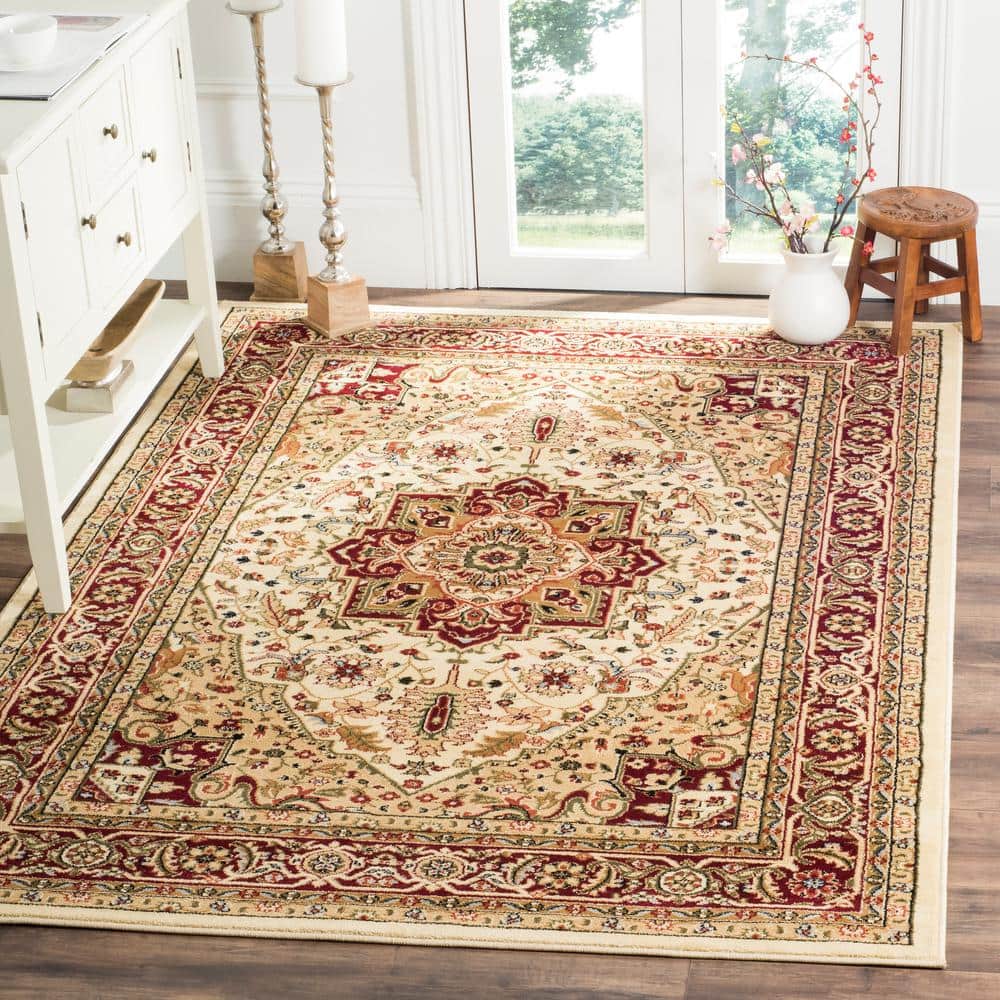 Ivory and Red Floral 6' x 9' Synthetic Area Rug
