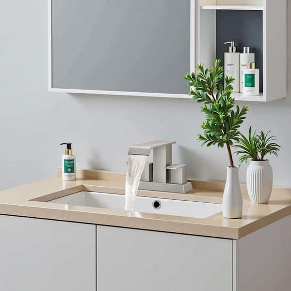 4 in. Centerset Double Handle Low Arc Bathroom Faucet with Pop-up Drain Included in Brushed Nickel