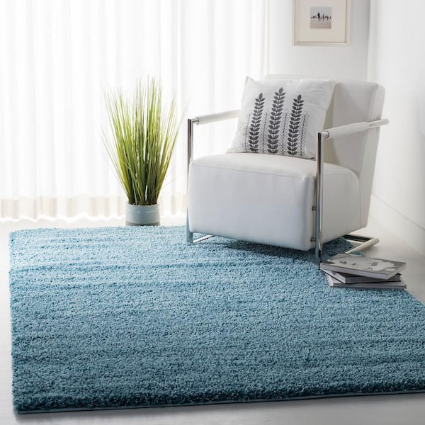 California Shag Turquoise 5 ft. x 8 ft. Solid Area Rug