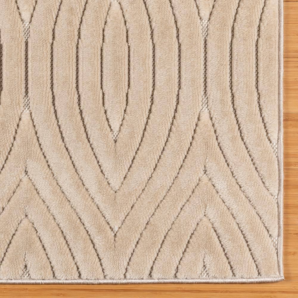 Beige Geometric Tufted Rectangular 6' x 9' Synthetic Rug