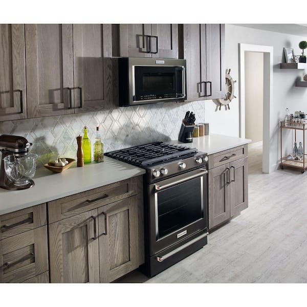https://images.thdstatic.com/productImages/a7a8acdb-c946-4f1b-a447-a2b755ddd83b/svn/black-stainless-with-printshield-finish-kitchenaid-single-oven-gas-ranges-ksgg700ebs-d4_600.jpg