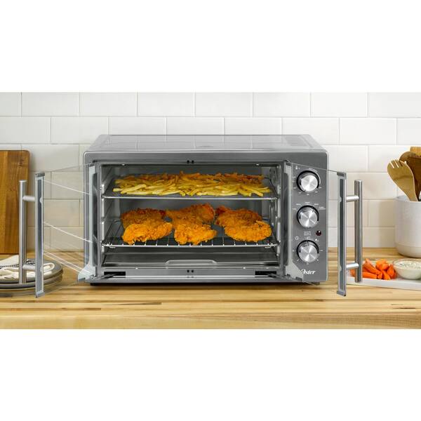 https://images.thdstatic.com/productImages/a7d760af-79ea-4659-9505-6ef5a46f1c04/svn/dark-stainless-steel-oster-toaster-ovens-2142004-c3_600.jpg