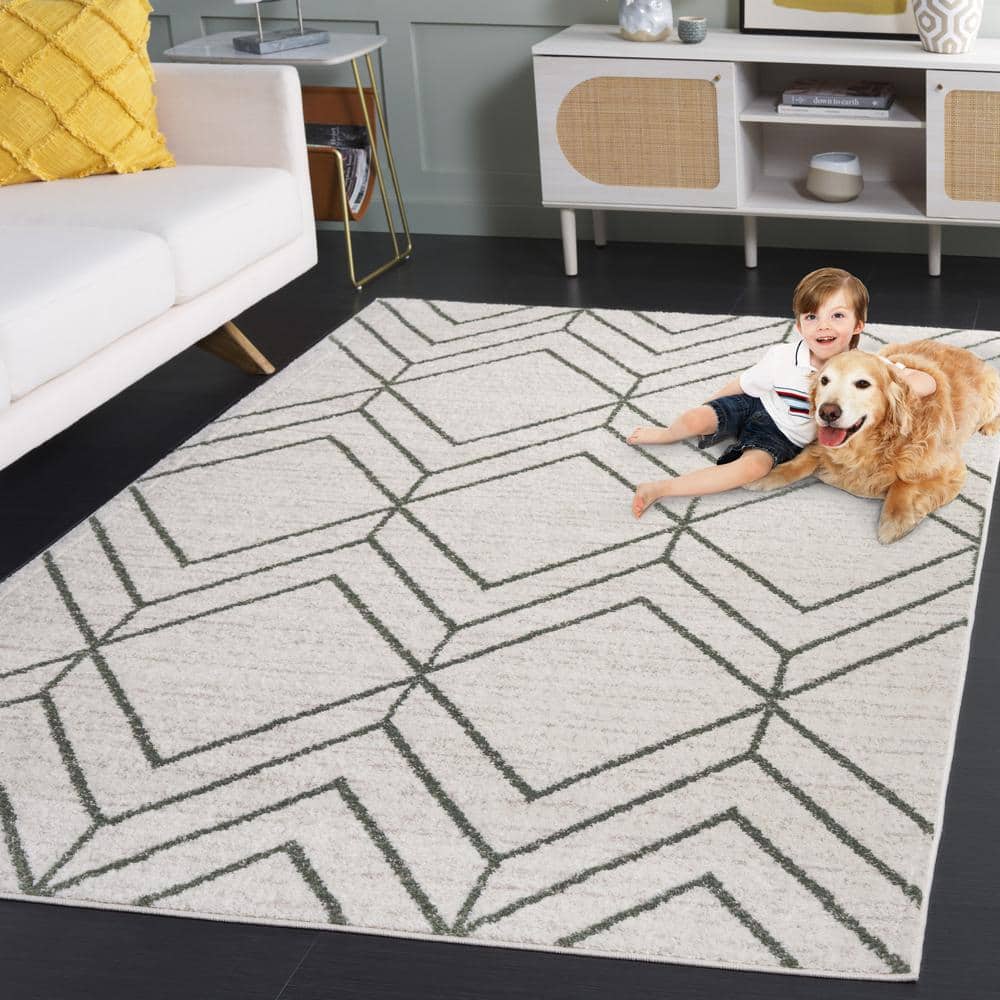 Ivory and Dark Green Geometric Synthetic Area Rug