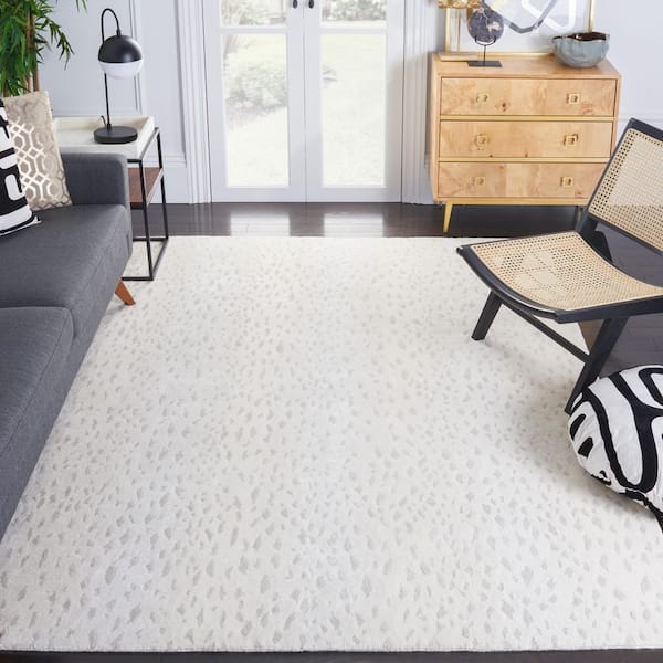 Tibetan 4 ft. x 6 ft. Ivory/Beige Abstract Spotted Area Rug