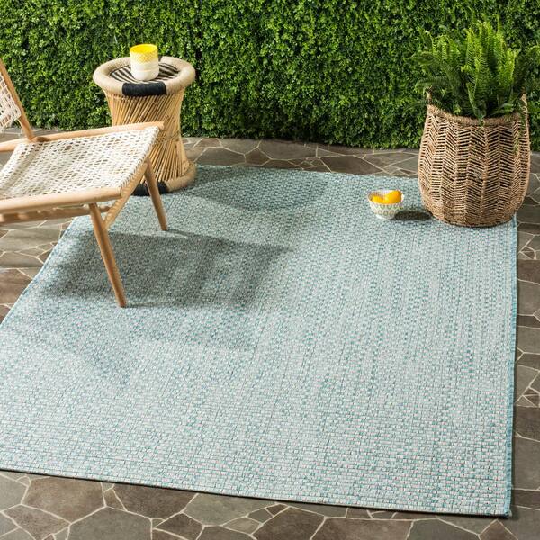 https://images.thdstatic.com/productImages/a7f43cd8-a6ca-4f4f-be69-be5ce5476242/svn/light-blue-light-gray-safavieh-outdoor-rugs-cy8653-37121-7sq-e1_600.jpg