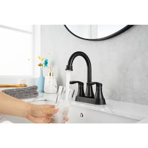 Mondawell Swivel 4 in. Centerset Double Handle Mid Arc Bathroom Faucet with Drain and Supply Lines in Bronze