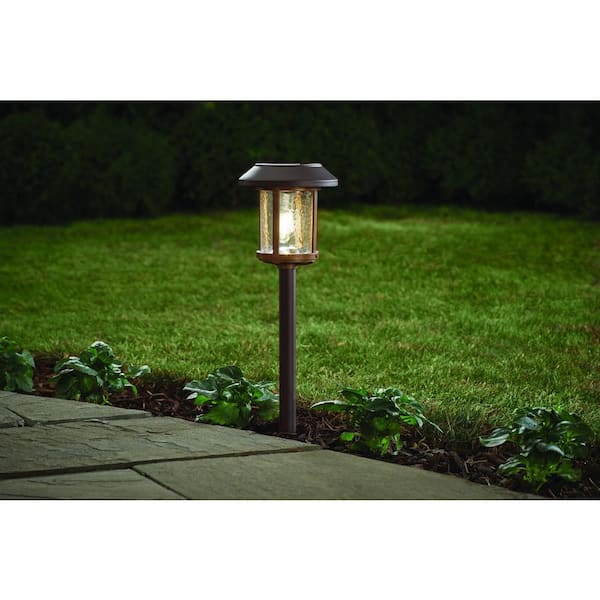 Hampton Bay Hawthorne 14 Lumens Bronze and Warm Wood LED Outdoor Solar Path Light with Ice Glass Lens and Vintage Bulb
