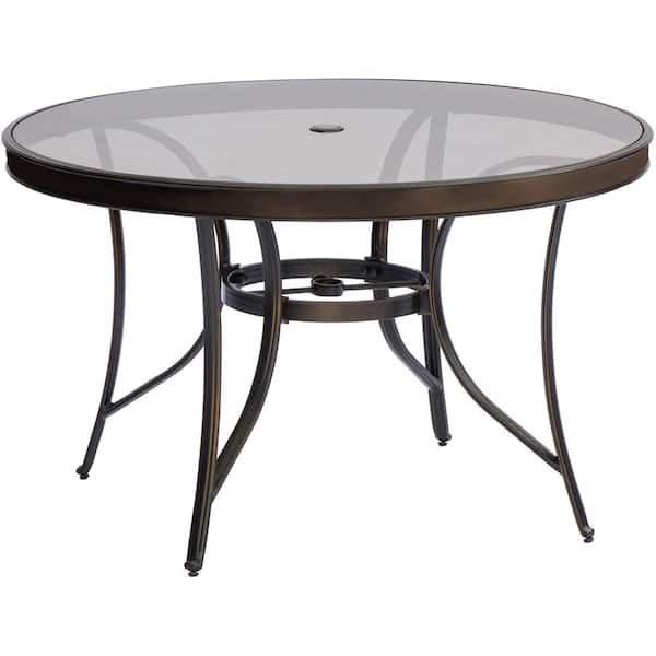 Round glass table with best sale four chairs