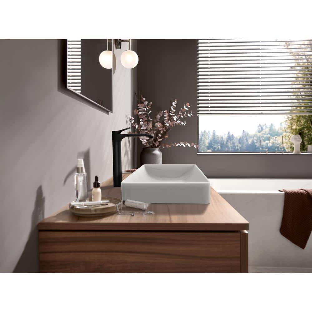 Elegantly Curved Matte Black Brass Vessel Faucet with Waterfall Stream
