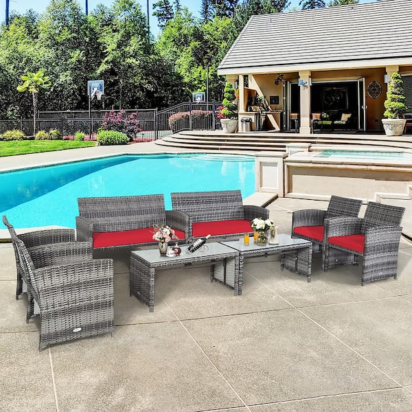 Costway 8-Piece Wicker Patio Conversation Set with Red Cushions and Glass Table