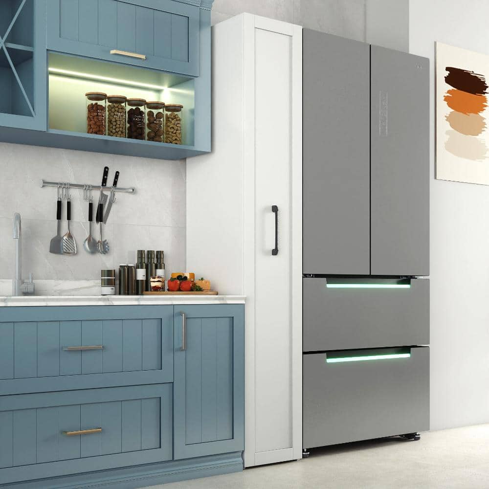 Kitchen scene with blue cabinets and a white storage cabinet.