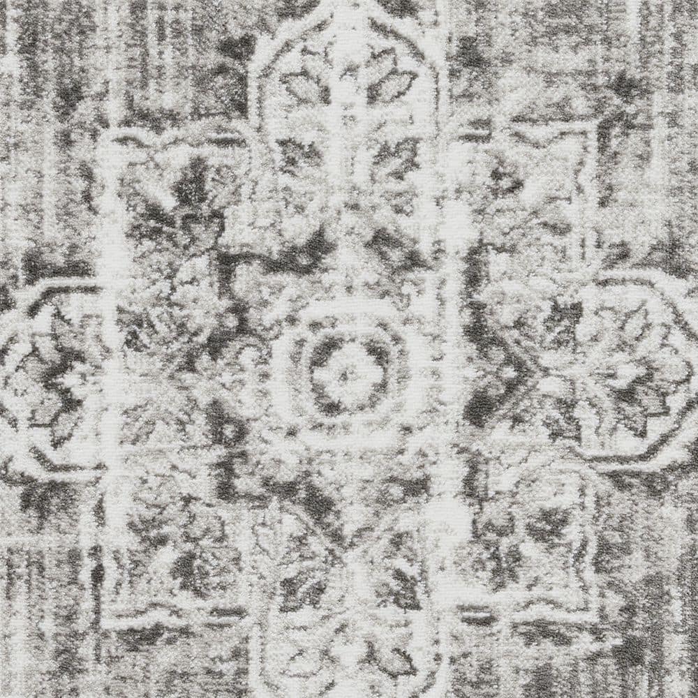 Ivory and Gray 9' x 12' Synthetic Oriental Rug