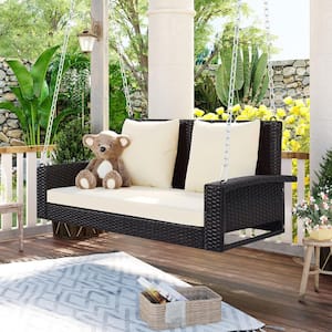 2-Person Brown Wicker Porch Swing with Beige Cushions
