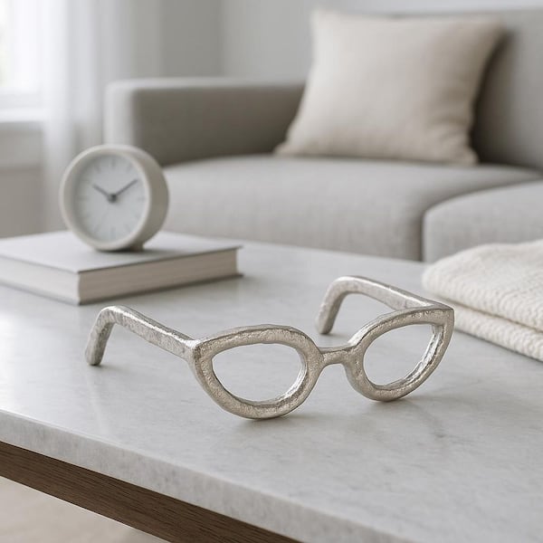 Liv & Skye Silver 7 in. x 3 in. Metal Abstract Cat Eye Glasses Sculpture