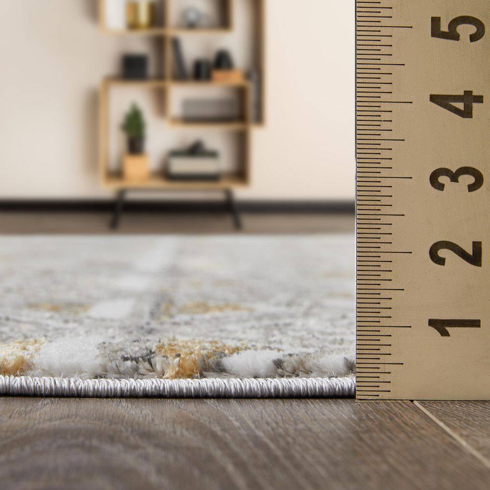 Beige and Yellow Geometric 2' x 3' Synthetic Area Rug